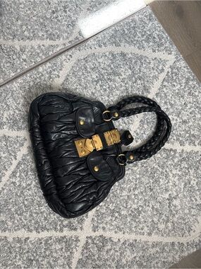 Miu Miu Black Quilted Shoulder Bag with Braided Handles and Gold Hardware